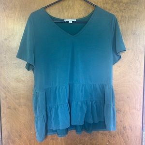 V-neck blouse with ruffles